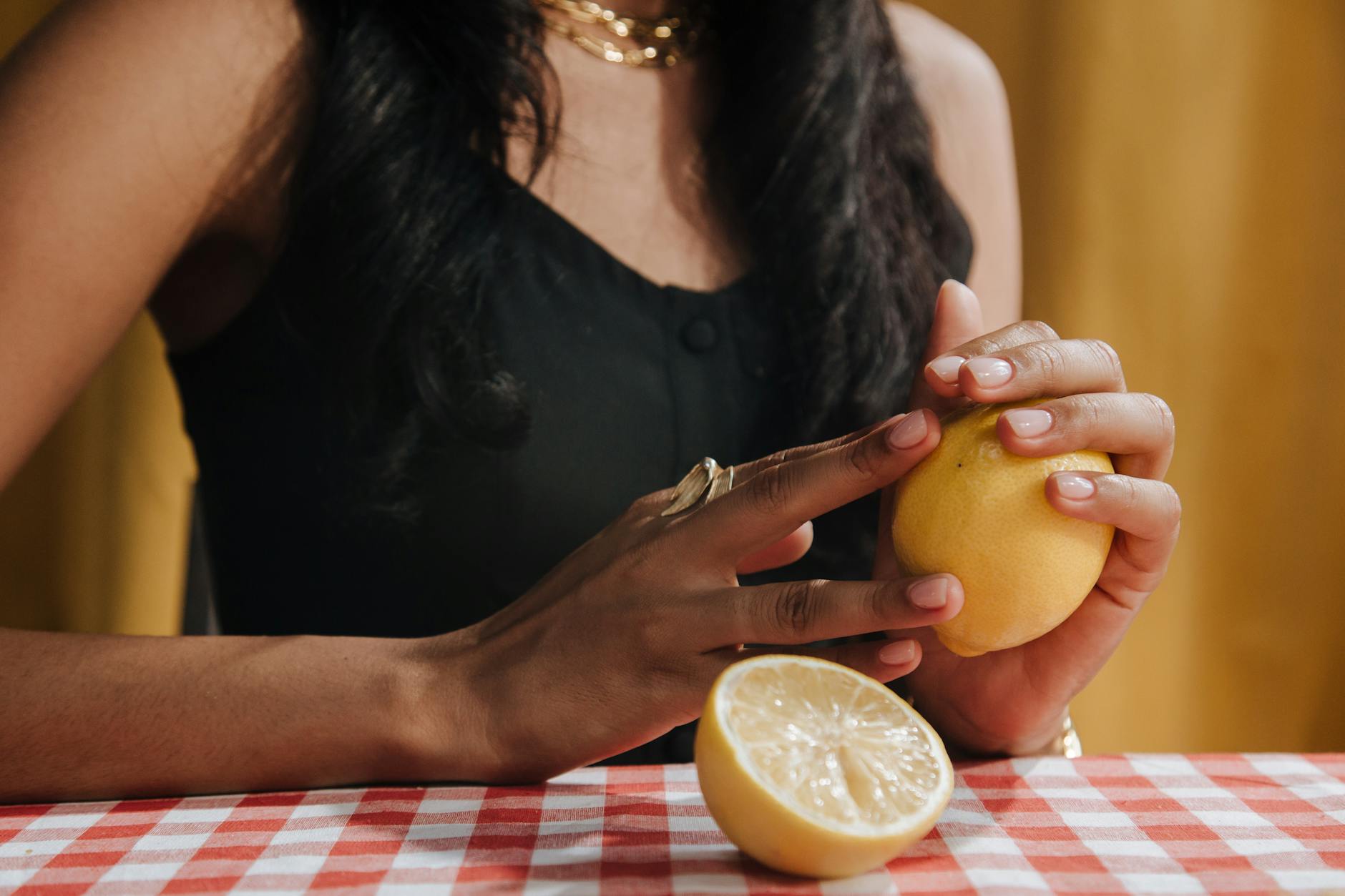 Woman holding colorful clitoral vibrators with confidence and ease